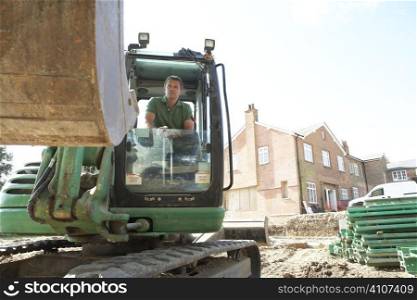 Construction Worker Using Digger
