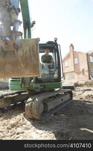 Construction Worker Using Digger