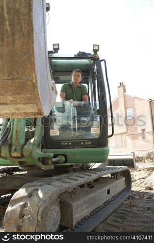 Construction Worker Using Digger