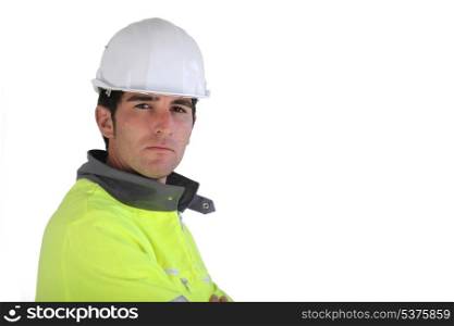 Construction worker wearing reflective jacket
