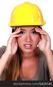 Construction worker with a headache