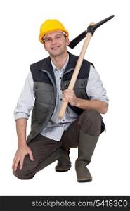 Construction worker with a pickaxe
