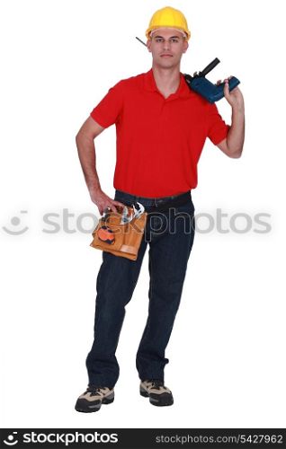 Construction worker with a power drill