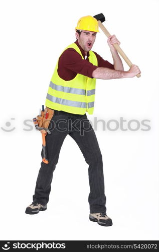 Construction worker with a sledgehammer