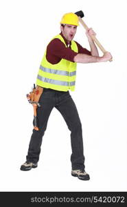 Construction worker with a sledgehammer