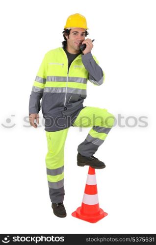 Construction worker with a walkie talkie