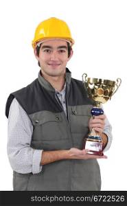 Construction worker with an award