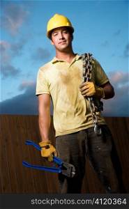 Construction Worker with Bolt Cutters and Chain