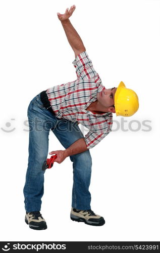Construction worker with his arm up