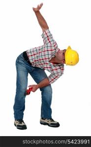 Construction worker with his arm up