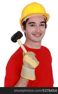 Construction worker with mallet