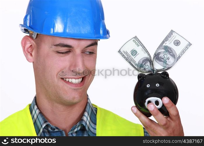 Construction worker with money