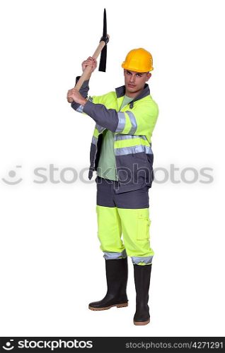 Construction worker with pick-axe