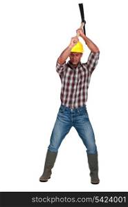 Construction worker with pickaxe