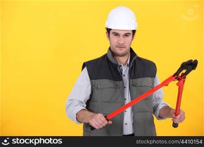 Construction worker with pliers.