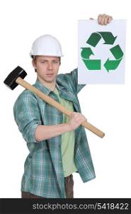Construction worker with recycling poster