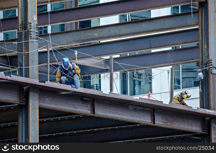 construction worker working on highrise building