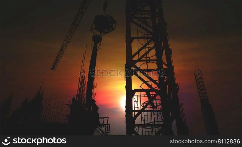 construction worker workloads in construction site . the worker put on cement reinforced in to the form with abstract sky sunset nature background