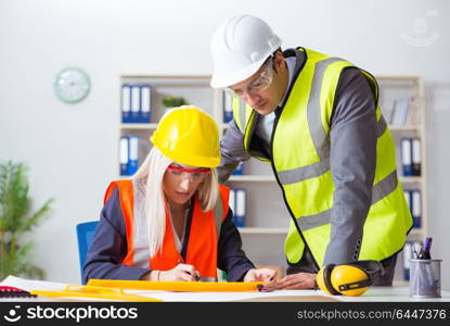 Construction workers having discussion in office before starting project. Construction workers having discussion in office before starting