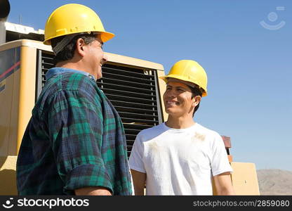 Construction Workers talking and smiling