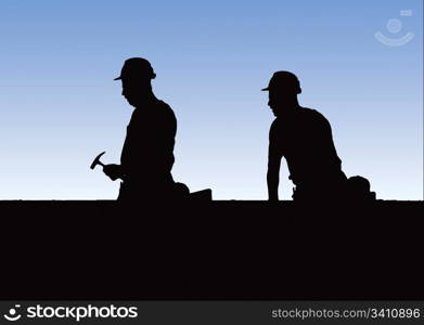 Construction workers work on building site.