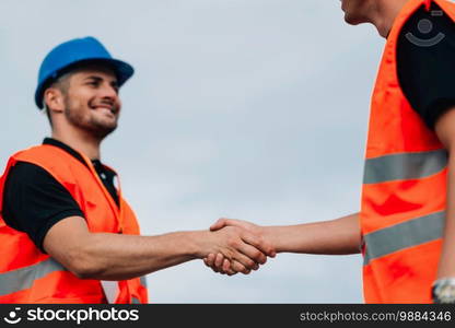 Construction Workershandshaking on Construction site