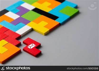 Contact us icon on colorful puzzle
