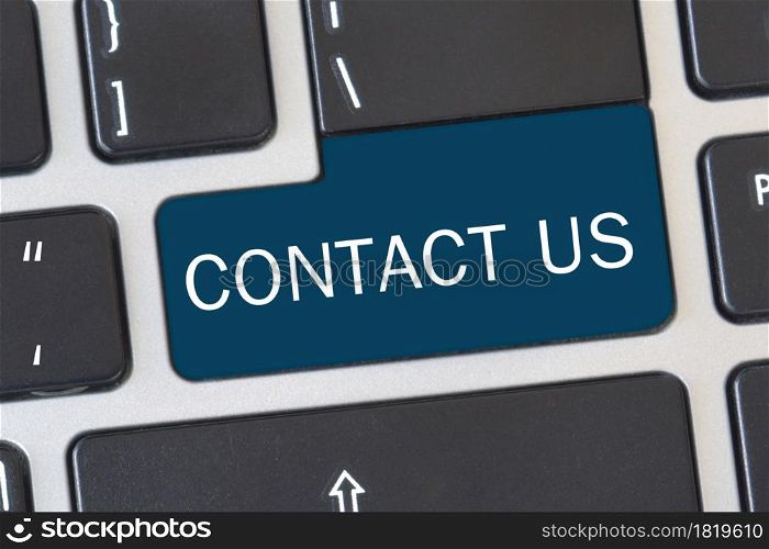 Contact us&rsquo; button on keyboard. Concept of internet online contact through website.