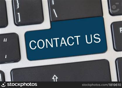 Contact us&rsquo; button on keyboard. Concept of internet online contact through website.