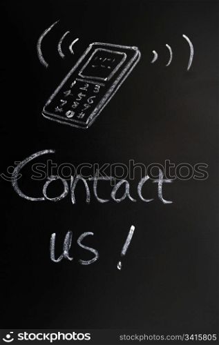 Contact us - text written in chalk on a blackboard