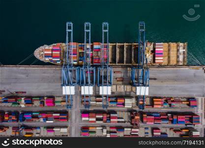 container dock terminal and shipping container loading and unloading import export international business services aerial view
