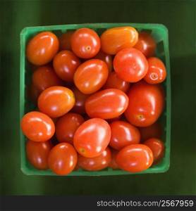 Container of red cherry tomatoes.