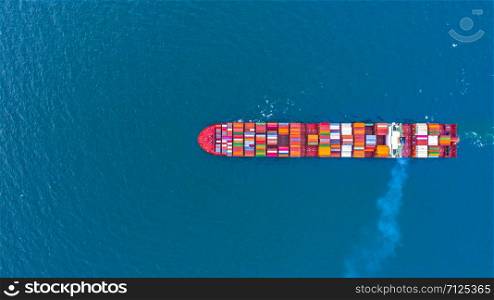 Container ship carrying container for business freight shipping import and export, Aerial view container ship arriving in commercial port.