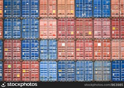 Container ship in export and import business and logistics in harbor industrial packing and water transport International shipping cargo / Box container texture background