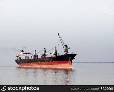 Container Ship, Old freighter ocean ship in import export logistic business and international transportation