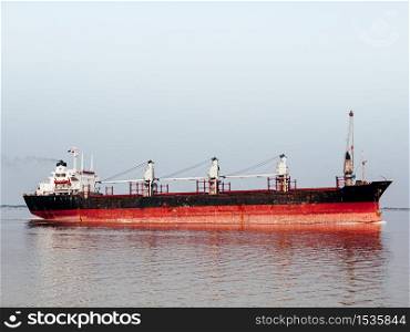 Container Ship, Old freighter ocean ship in import export logistic business and international transportation