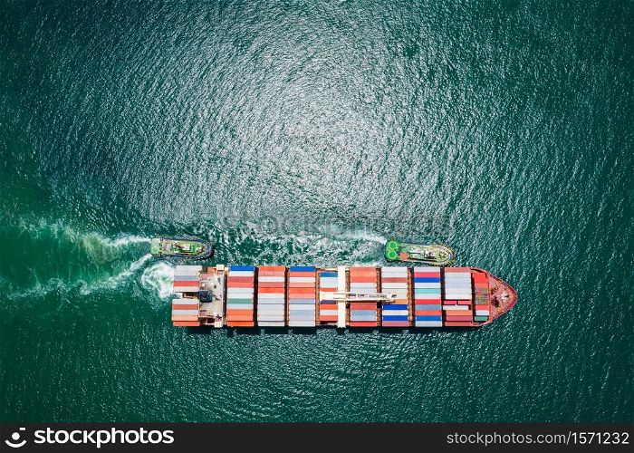 Container ship sailing the ocean, Business cargo logistics service and transportation of International container ship in the ocean freight transportation, Aerial view Container loading cargo freight