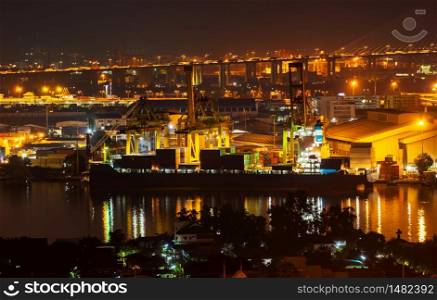 container ships loading and unloading in Ports of Chao-phraya river in Bangkok, Thailand