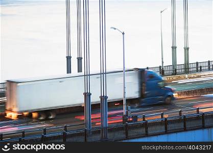Container truck crossing bridge