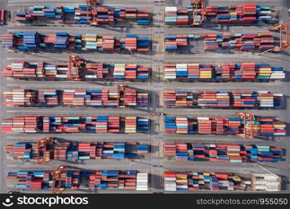 containers to be loaded on to the ship for transportation by the sea asia pacific aerial top view
