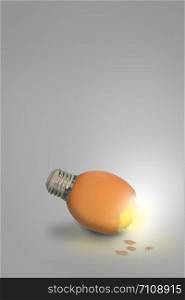 Contemporary art of lightbulb egg on grey background with copy space, Vertical image.