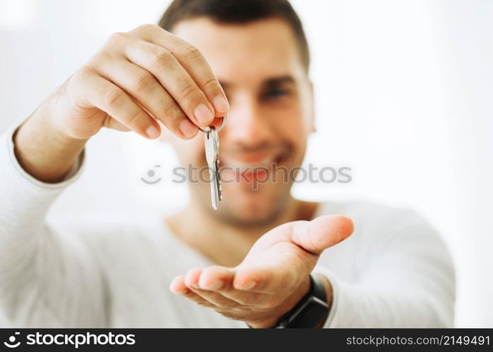 content man holding new keys