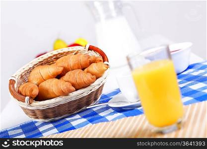 Continental breakfast with croisant and orane juice