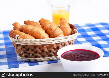 Continental breakfast with croisant and orange juice