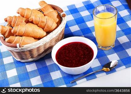 Continental breakfast with croisant and orange juice