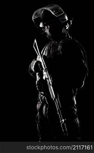 Contour shot of spec ops soldier on black background