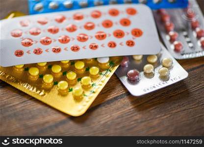 Contraceptive pill Prevent Pregnancy Contraception concept Birth Control on wooden background / health care and medicine - Oral contraceptive pills