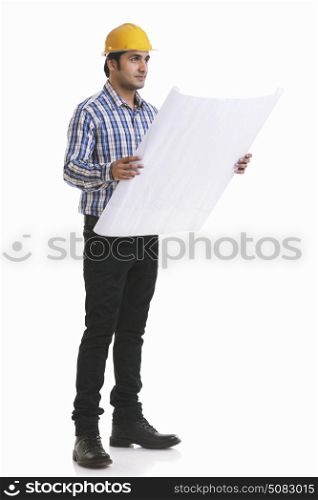 Contractor holding blueprint