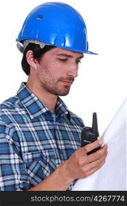 Contractor with radio receiver and plans