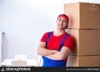 Contractor worker moving boxes during office move